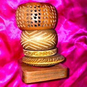 Vintage Sassy Jones wooden bracelets. These are from
different sets sold as one.